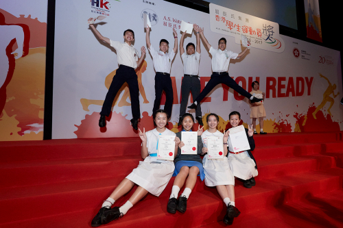 Photo 6: Being recognized for their achievements, student awardees smile with a glow.