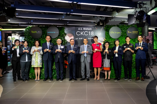 Officiating guests and store managers toast the grand opening of CKC18 with Sake