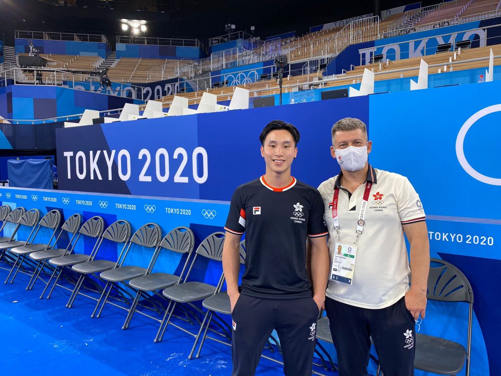 Mr Stone Shek (left) and his coach at the Tokyo Olympic Stadium. Mr Stone Shek participated in the HKSSA video interview: https://youtu.be/bjrpzoY5BfM